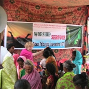 Sister Irene praying for the sick